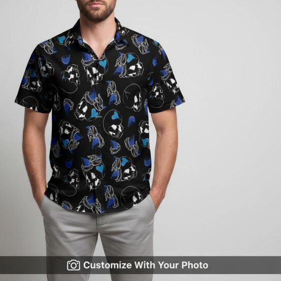 Man in Halloween Skull Hawaiian shirt featuring black, white, and blue abstract skulls.