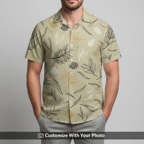 Man in casual beige Hawaiian shirt featuring gold and black abstract floral print