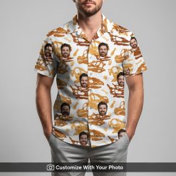 Man in mens Hawaiian shirt with dinosaur skulls design and custom face pattern outside