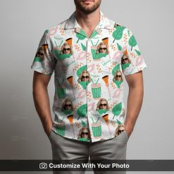 Man in vibrant custom Hawaiian shirt with sunglasses face and green leaf design