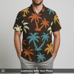 Man modeling a tropical button up shirt with cream, orange and blue palm trees