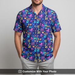 Man in Ocean Octopus Hawaiian shirt featuring pink, blue, and yellow coral patterns