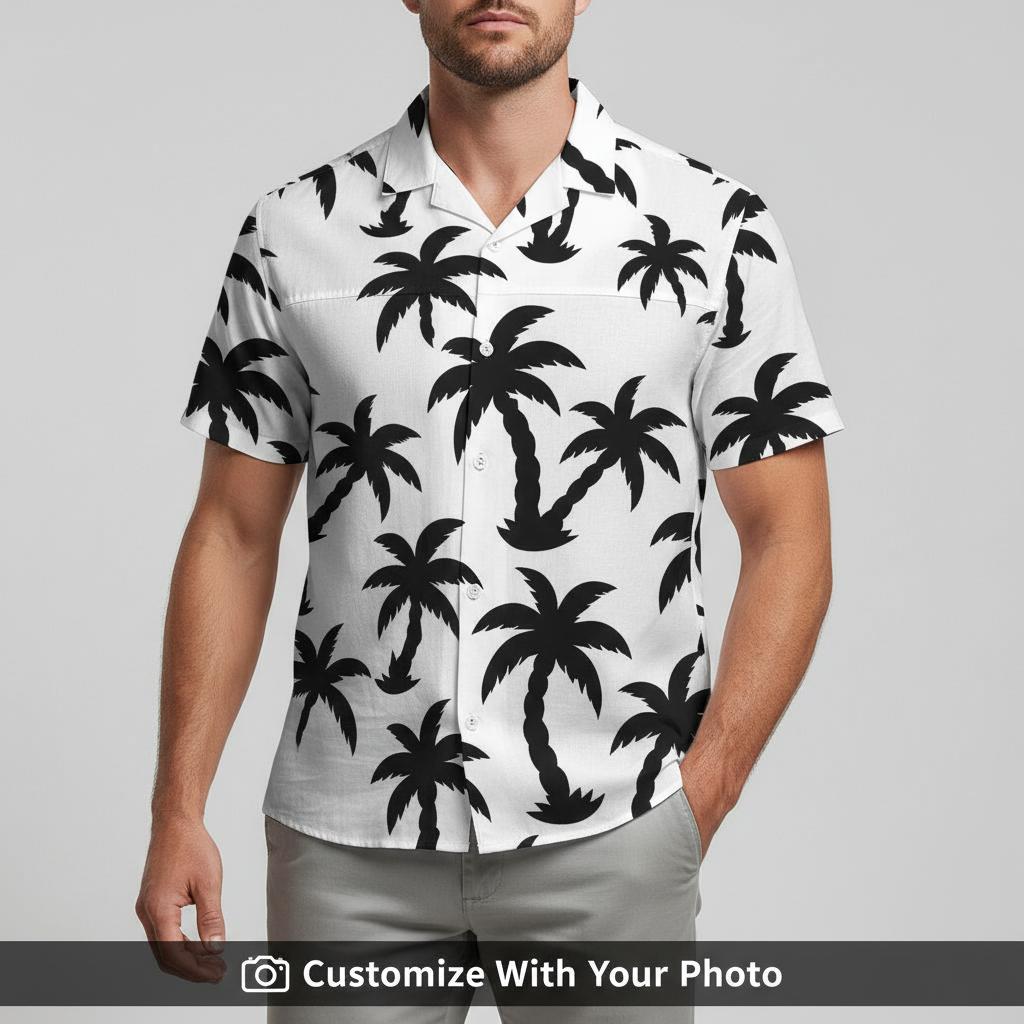 Man in black and white palm tree Hawaiian shirt styled with bold tropical motifs