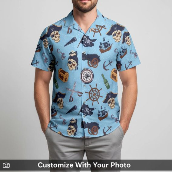 Man in blue pirate skull Hawaiian shirt with treasure map and nautical ships design