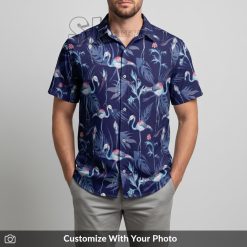 Man in purple Hawaiian shirt with pink flamingos and tropical leaves at a beach