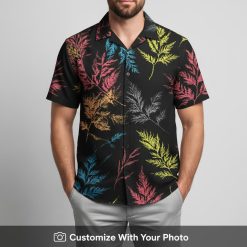 Man wearing Reyn Spooner vintage Hawaiian shirt with colorful leaf pattern