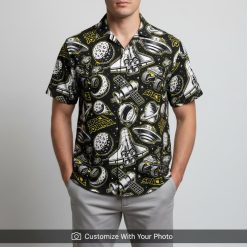 Man in Star Wars Hawaiian shirt featuring rockets, Saturn planets, and shuttles print