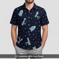 Man sporting Star Wars Tiki Hawaiian shirt with all over blue rockets and stars print
