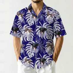 Mens tropical button up shirt with cat and dog photos arranged on white monstera leaves