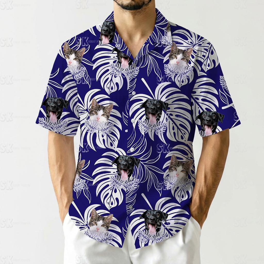 Mens tropical button up shirt with cat and dog photos arranged on white monstera leaves