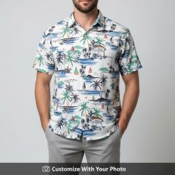 Man in tropical print short sleeve shirt with blue sailboats and palm trees