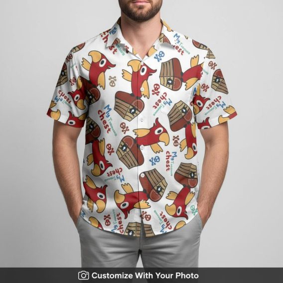 man grilling at BBQ in white shirt featuring cartoon parrot and chests