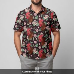 Man wearing Red Rooster Hawaiian Shirt with striking red roosters and tropical flowers on a dark background.