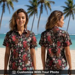 Woman wearing Red Rooster Hawaiian Shirt with bold tropical flair, showcasing vibrant red and green rooster pattern and hibiscus flowers on a dark background.