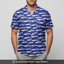 san jose sharks hawaiian shirt with blue shark pattern worn by man at beach café