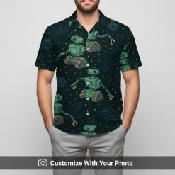 Man wearing Star Wars Hawaiian shirt featuring green robot and stellar motifs