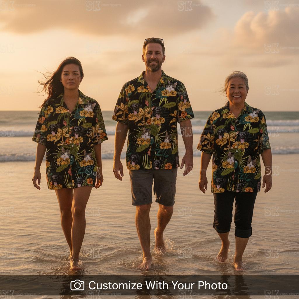 Family group wearing matching tropical button up shirts at beach during sunset Group of people wearing matching tropical button up shirts standing in water