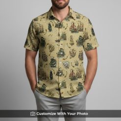 Man in beige pirate ship Hawaiian shirt with sailing ships and island patterns