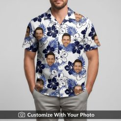 Man wearing white Hawaiian shirt with blue hibiscus flowers and custom face design