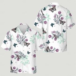 Detailed butterflies with purple and green flowers on tropical print shirt background