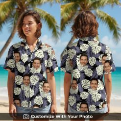 Woman wearing a black Hawaiian shirt with custom face and tropical monstera print