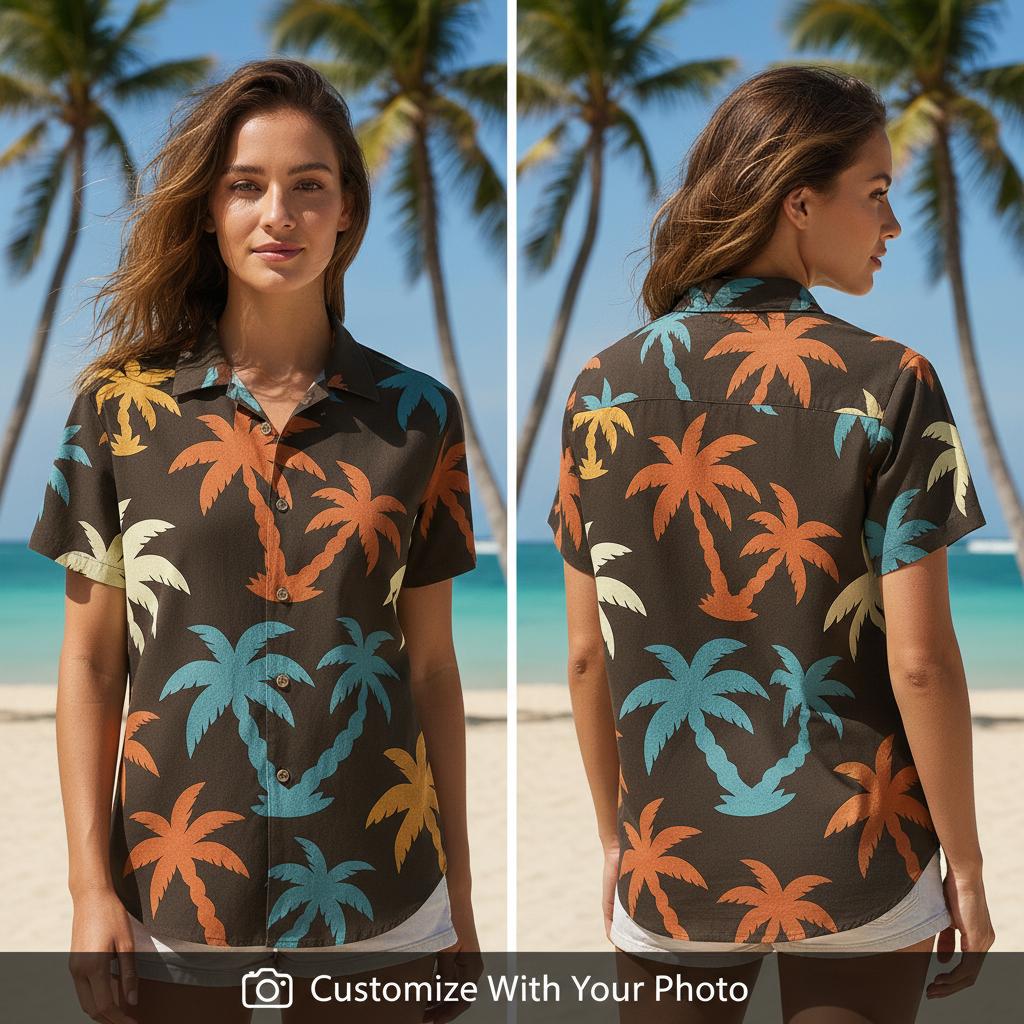 Woman wearing a tropical button up shirt with orange and blue palm trees on black