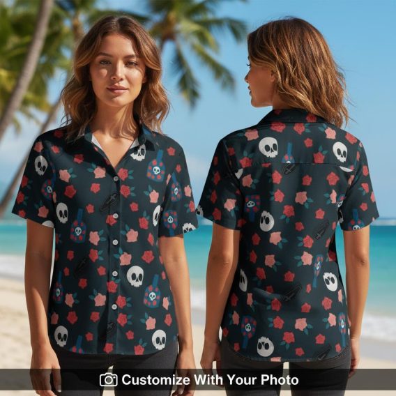 Woman wearing black Hawaiian shirt with skulls, red flowers, and blue-white coffins