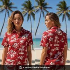 Woman wearing red Hawaiian shirt with bold white palm tree and hibiscus floral print