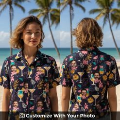Woman in black Hawaiian shirt with colorful face pattern and tropical cocktails