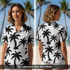 Woman wearing black and white palm tree Hawaiian shirt with bold contrasting colors