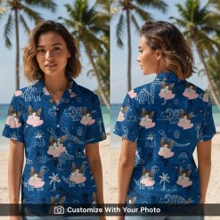 Woman wearing blue Hawaiian shirt with cat face, pink hearts, and fun dinosaur print