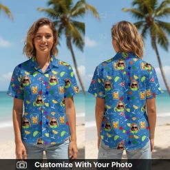 Woman wearing blue Hawaiian shirt with cocktails, faces, sunglasses and colorful summer pattern