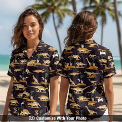 Woman wearing Dinosaur Hawaiian shirt with black dog faces and gold skeleton patterns