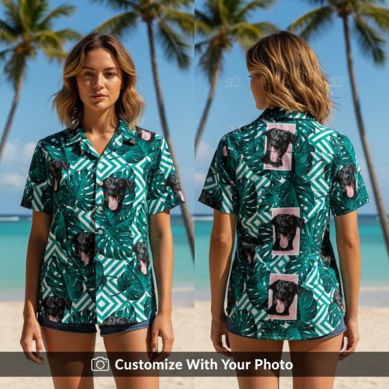 Woman wearing a white tropical Hawaiian shirt with black dog and teal monstera leaves