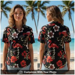 Woman at backyard BBQ in black flamingo shirt with red flowers and green leaves