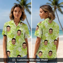 Woman wearing custom green tropical Hawaiian shirt with palm leaves and face design