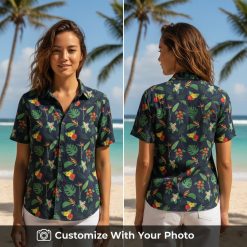 Woman wearing a vibrant tropical floral Hawaiian shirt at a sunny beach party