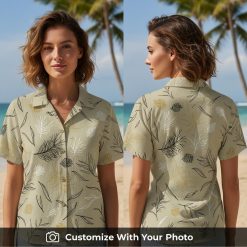Woman wearing beige and gold Hawaiian shirt with black and white floral patterns outdoors