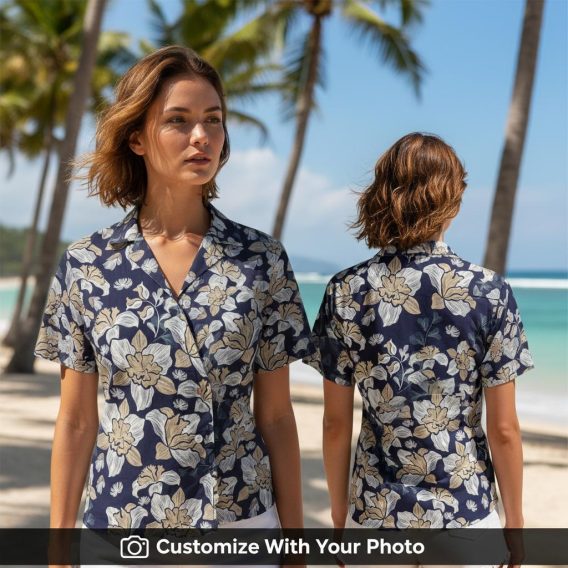 Woman in navy blue floral Hawaiian shirt with beige and white flowers, summer beach style
