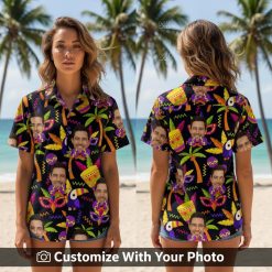 Woman wearing neon Hawaiian shirt with masks, drums, palm trees and tropical vibes