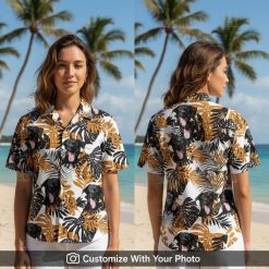 Woman wearing personalized dog Hawaiian shirt featuring black dog and orange leaves