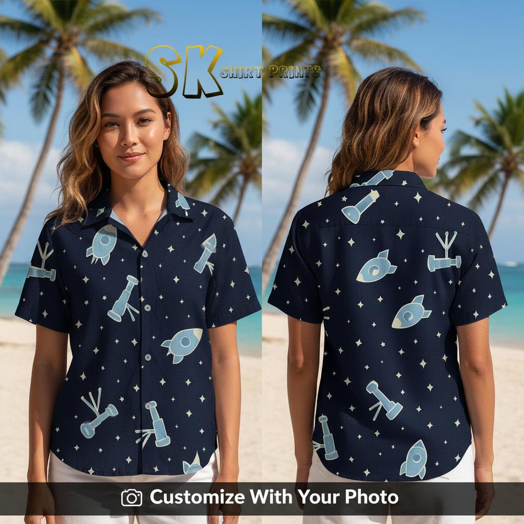 Woman wearing R2-D2 Hawaiian shirt with rockets, telescopes, stars in blue and white