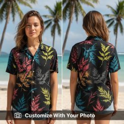 Woman in a Reyn Spooner vintage Hawaiian shirt with bold pink and yellow leaves