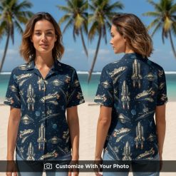 Woman wears spaceship pattern Hawaiian shirt with blue background and vibrant UFO designs