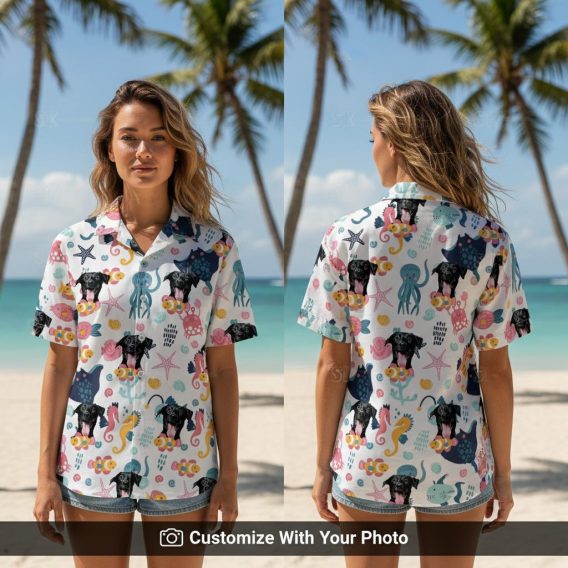 Woman wearing a colorful Spongebob Hawaiian shirt with black dog and sea creatures