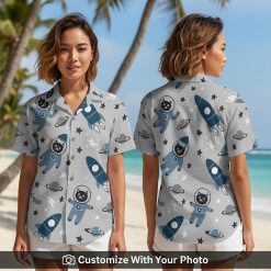 Woman wearing Star Wars Hawaiian shirt with black cat astronaut and space design