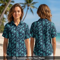 Woman wearing Star Wars Hawaiian shirt with navy, turquoise, rockets and astronaut prints