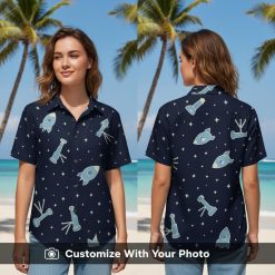 Woman wearing Star Wars Tiki shirt in dark blue with rockets and telescopes design