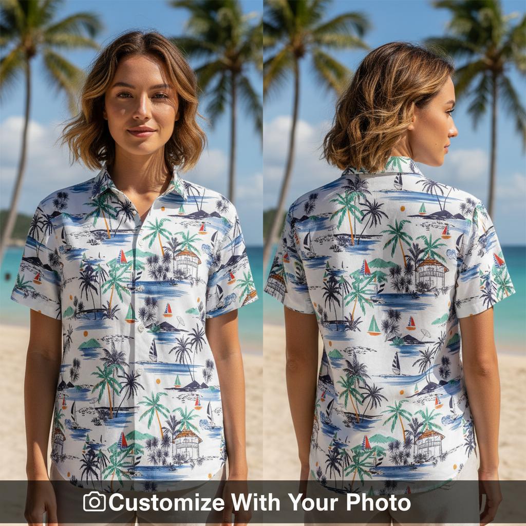 Woman wearing tropical print short sleeve shirt with sailboats and palm trees