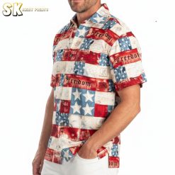 Man posing outdoors in American flag themed Hawaiian shirt with tropical red white blue pattern